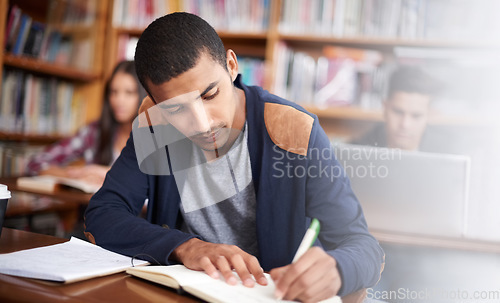 Image of Study, writing and school with man in library for education, research and classroom quiz. Focus, learning and notebook with male student on university campus for knowledge, scholarship and project