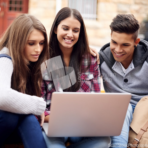 Image of Students, laptop and research on campus for group project, diversity and online education in college. Learning, studying and happy friends at university with smile, internet and future opportunity.