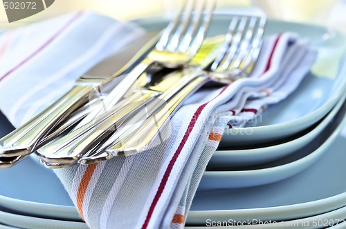 Image of Plates and cutlery