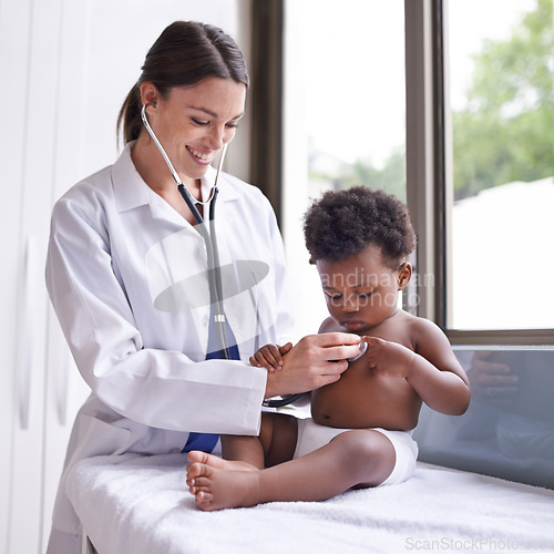 Image of Doctor woman check baby boy heart with stethoscope, pediatric cardiology and health with childhood development. Female pediatrician, African and male toddler in medical checkup at clinic or hospital