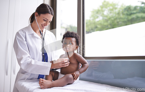 Image of Doctor woman with baby boy in pediatrician consultation, stethoscope to check heart and lung health. Pediatric cardiology, childhood development with medical checkup at clinic or hospital