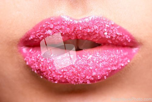 Image of Woman mouth, pink lipstick and sugar scrub closeup, makeup and beauty with exfoliation and sparkle. Bright aesthetic, female model lips and cosmetics product, cosmetology with cosmetic lip care