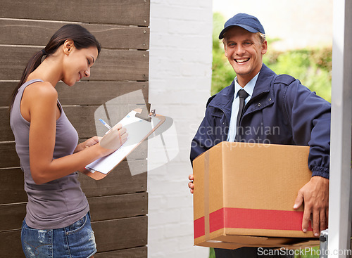 Image of Smile, delivery and woman signing for a package or using pen from postman for logistics and courier for client. Freight, box and stationery or lady receiving cargo or writing and shipping company