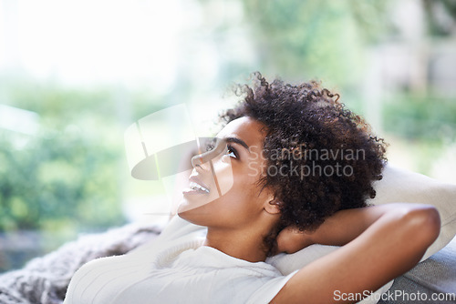 Image of Relax, thinking and happy woman on sofa in lounge, afternoon nap and rest in calm apartment on weekend. Daydream ideas, peace and girl on couch relaxing, self care and stress free chill time in home.