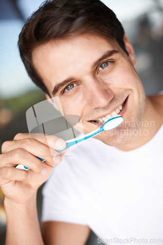 Image of Brushing teeth, man portrait and cleaning closeup for oral hygiene and health. Smile, dental and toothbrush with a male person face with happiness in the morning at a house with self care and routine