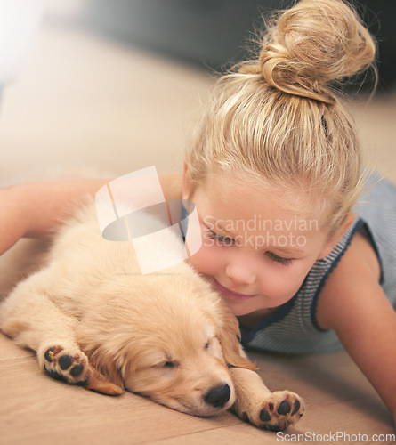 Image of Girl child hug her puppy, relax at home and happy with sleeping golden retriever dog, friends and peace. Pet care, love and young, calm female kid with her domestic animal lying on wood floor