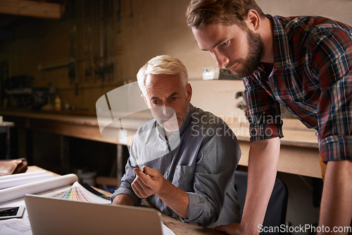 Image of Architects, teamwork and father and son with laptop in workshop for building construction. Senior engineer, men and computer with trainee or apprentice working on design and planning with mentor.