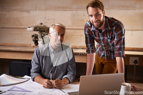 Image of Carpentry, teamwork and portrait of men in workshop for collaboration with laptop. Senior architect, smile and father and son working on construction project with trainee, apprentice and mentor.