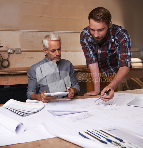 Image of Architecture men, planning and blueprint with tablet for discussion, construction or vision in workshop. Senior man, young male partner and talking with paperwork, property or real estate development