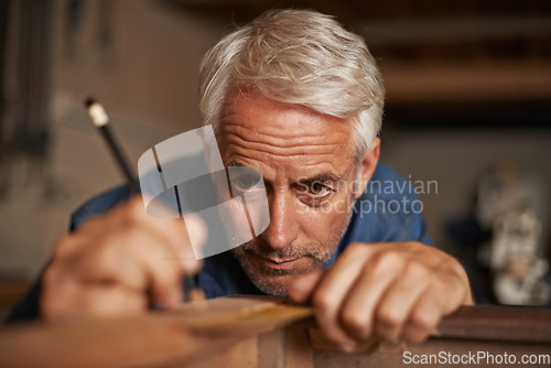 Image of Carpentry, measurement and focus, man with pencil, ruler and professional furniture manufacturing workshop. Creativity, small business and expert carpenter planning sustainable wood project design.