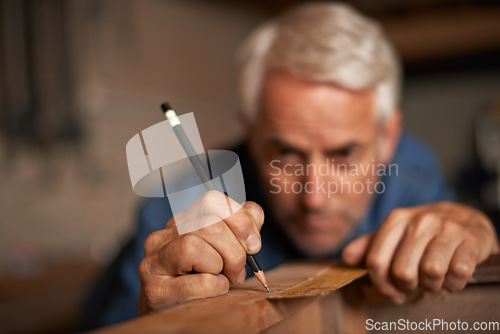 Image of Carpentry, hands of man with pencil, measurement and professional furniture manufacturing workshop. Creativity, small business and focus, expert carpenter working on sustainable wood project design.