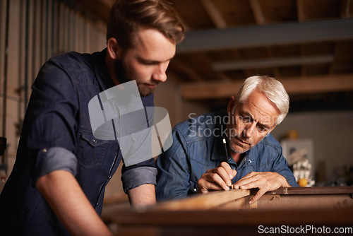 Image of Training, learning and carpentry apprentice with man, teaching woodwork and professional furniture manufacturing. Mentorship, expert carpenter and student working on sustainable wood project design.