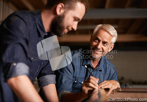 Image of Smile, learning and carpenter with apprentice in training, man teaching professional furniture manufacturing. Mentorship, expert carpentry and happy man with student working at wood project workshop.