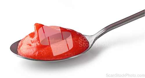 Image of tomato puree in spoon