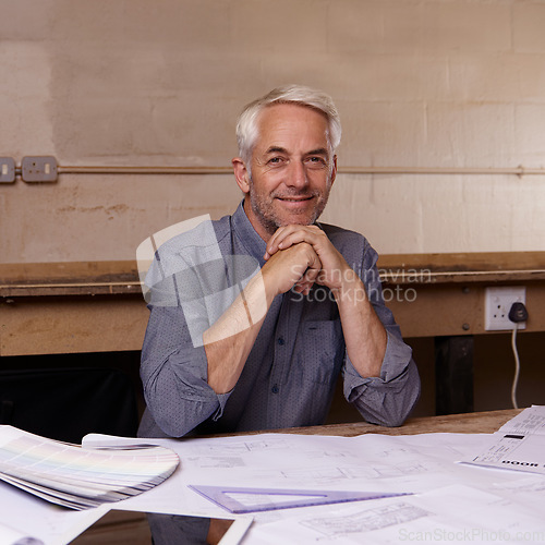 Image of Man, senior architect smile in portrait and blueprint in workshop, professional designer and engineering. Architecture design, floor plan paperwork with designing equipment and creative male engineer