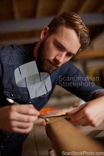 Image of Woodwork, measurement and carpenter with pencil, wood restoration and furniture manufacturing workshop. Focus, small business and expert carpentry trade, man working on sustainable project design.