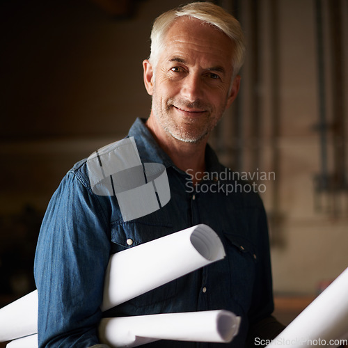 Image of Senior architect, blueprint and man with smile in portrait, renovation or remodeling project with floor plan. Architecture industry, engineer and male professional designer with vision and mission