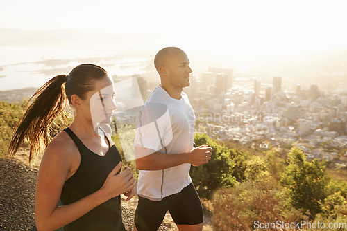 Image of Sunrise, fitness and coach running with woman as workout or morning exercise for health and wellness together. Sport, marathon and runner run with man athlete for training for energy or sports