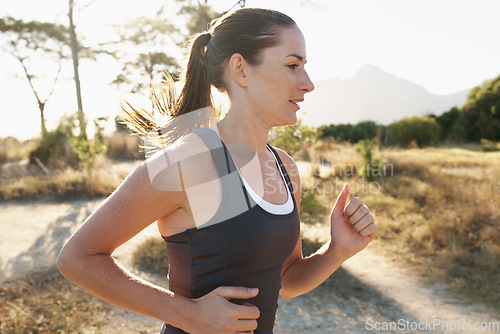 Image of Running, exercise and woman training, workout and sports with balance, wellness and cardio outdoor. Female person, runner and athlete with breathing, fitness and practice with goal, target and health