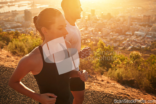 Image of Sunrise, fitness and personal trainer training woman as workout or morning exercise for health and wellness. Sport, marathon and runner run with man athlete in a city for sports and energy