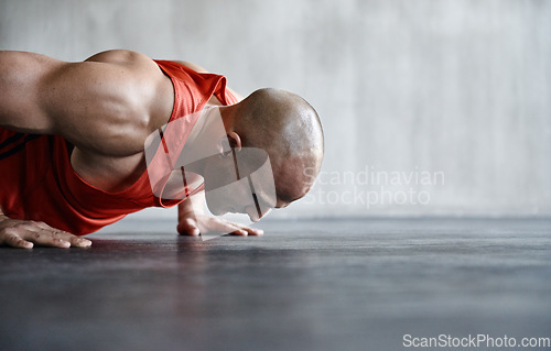 Image of Fitness, muscle strength and man doing push up for fitness studio exercise, gym commitment or endurance. Health club mockup, bodybuilder goals and male body builder training, exercising or practice