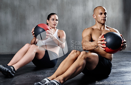 Image of Medicine ball, health and fitness people doing bodybuilding workout, core muscle strength and gym performance. Exercise commitment, athlete teamwork and strong team exercising for active lifestyle