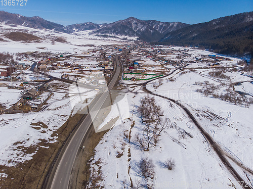 Image of Aerial view of a winter road