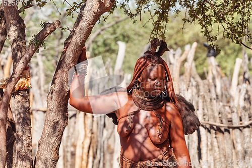 Image of Himba woman with in the village, namibia Africa