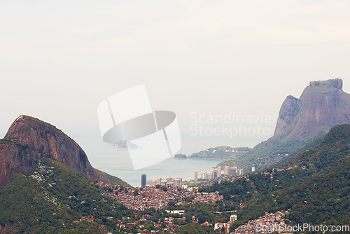 Image of Brazil, landscape and aerial of city in mountain for traveling destination, holiday and global vacation. Travel, Rio de Janeiro and view of cityscape by ocean for tourism, sightseeing and background