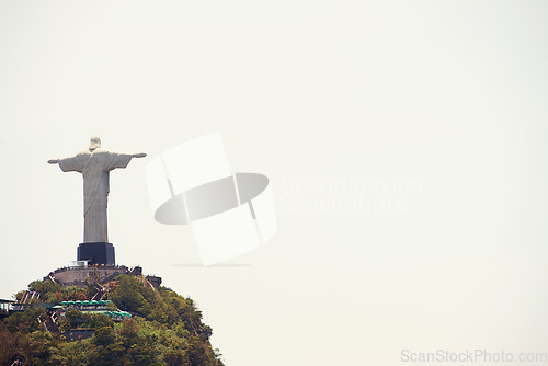 Image of Brazil, statue and aerial of Christ the Redeemer on hill for tourism, sightseeing and travel destination. Traveling, Rio de Janeiro and drone view of monument, sculpture and city landmark on mountain