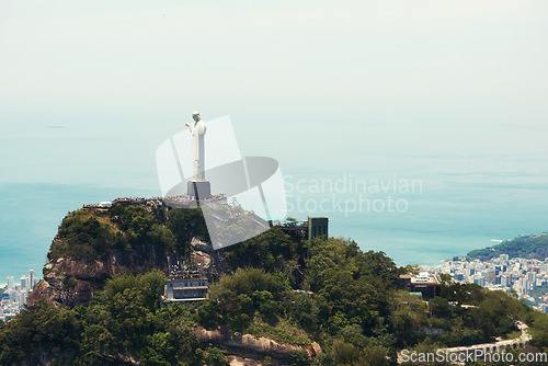 Image of Landscape, monument and Christ the Redeemer in Brazil for tourism, sightseeing and travel destination. Traveling mockup, Rio de Janeiro and aerial view of statue, sculpture and landmark on mountain