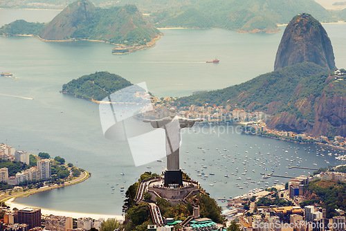 Image of Brazil landscape, city and Christ the Redeemer on hill for tourism, sightseeing and travel destination. Traveling, Rio de Janeiro and aerial view of statue, sculpture and global landmark on mountain