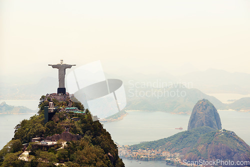 Image of Landscape, monument and aerial of Christ the Redeemer for tourism, sightseeing and travel destination. Traveling, Rio de Janeiro and drone view of statue, sculpture and Brazil landmark on mountain