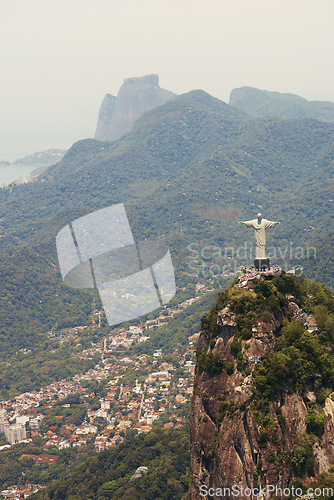 Image of Brazil, statue and aerial of Christ the Redeemer on mountain for tourism, sightseeing and travel destination. Traveling, Rio de Janeiro and drone view of monument, sculpture and city mockup on hill