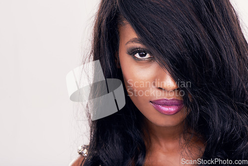 Image of Portrait, hair and beautiful black woman in studio for keratin, treatment and cosmetics on white background. Haircare, extensions and face of model pose with weave, wig and brazilian beauty results