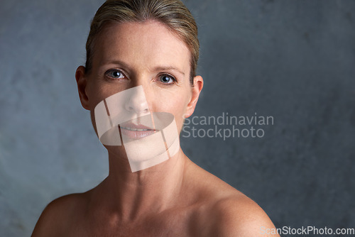 Image of Mature woman, skincare model and portrait with natural beauty and cosmetic dermatology. Isolated, gray background and female person face with facial treatment and self care with anti aging cosmetics