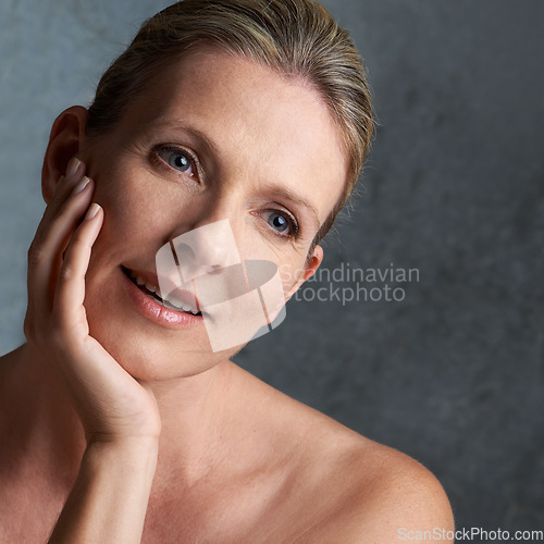 Image of Mature woman, skincare closeup and face with natural beauty and cosmetic dermatology. Isolated, gray background and female person with facial treatment and self care with anti aging cosmetics