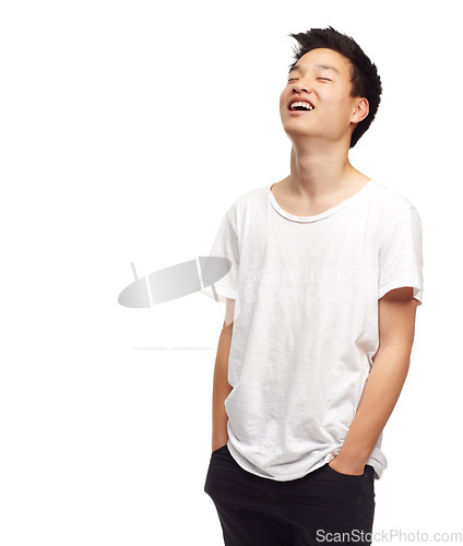 Image of Laughing, happy teenager and Asian male person in studio hearing funny joke with mockup. White background, laugh and happiness of a teenager with casual style and gen z fashion with youth and smile