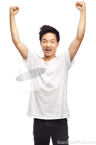 Image of Yes, winning and portrait with a Asian male teen with youth and achievement in studio. Winner, excited and teenager with white background and victory win with a smile and happiness feeling success