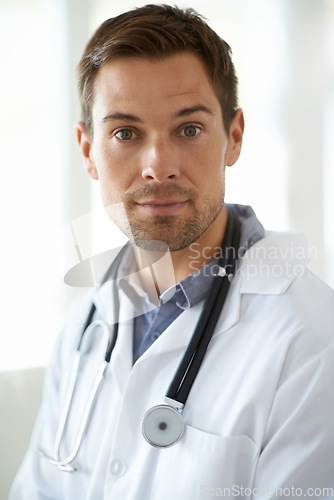 Image of Portrait, serious man and doctor in clinic for healthcare management, hospital services and help. Face of male employee, medical therapist and surgeon for trust, integrity and professional experience