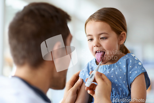 Image of Kid, doctor and thermometer in mouth for fever, medical risk and assessment of covid infection. Pediatrician, sick girl and temperature test of children, flu virus and healthcare consulting in clinic