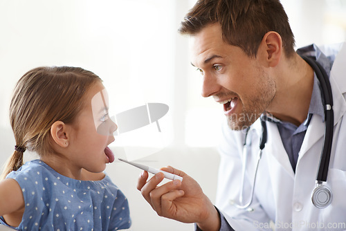 Image of Child, male doctor and thermometer in clinic for medical risk of covid infection, flu and fever. Pediatrician, sick girl kid and testing temperature in mouth for disease, healthcare service and virus