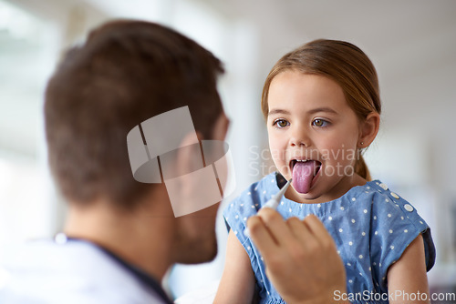 Image of Kid, doctor and thermometer in mouth at hospital of medical risk, covid infection and fever. Pediatrician, sick girl and testing temperature of children, flu virus and healthcare consulting in clinic