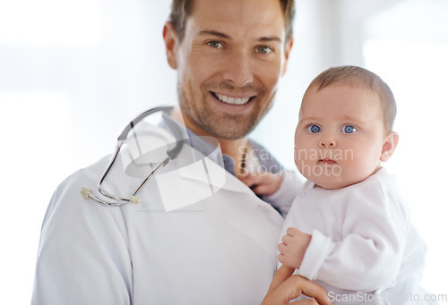 Image of Portrait, happy man and pediatrician with baby for hospital assessment, medical support and growth. Pediatrics doctor holding newborn kid in clinic for healthcare service, trust and helping children