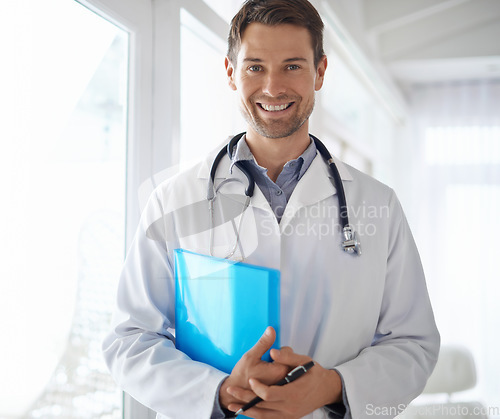 Image of Portrait of happy man, doctor and folder in hospital for healthcare management, clinic services and report. Male medical employee, professional therapist and smile for confidence, trust and integrity