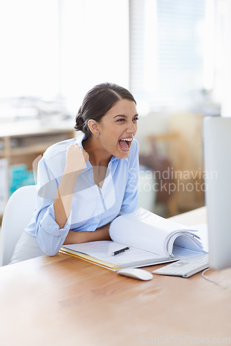 Image of Winning, yes and business woman on computer for online success, promotion or reading news in fist pump. Happy professional person or winner excited, cheers and celebration on desktop for opportunity