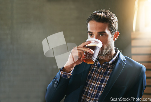 Image of Business man at pub, drinking beer and relax, social time or event with professional person at bistro. Hospitality industry, male customer at restaurant enjoying alcohol drink, thirsty with mockup