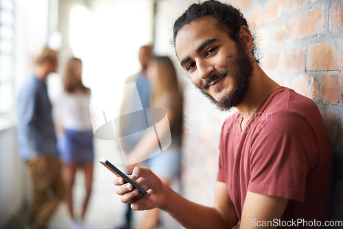 Image of College, phone and portrait of man in hallway for social media, technology or internet. Eduction, learning and scholarship with student on university campus for connection, contact or text message