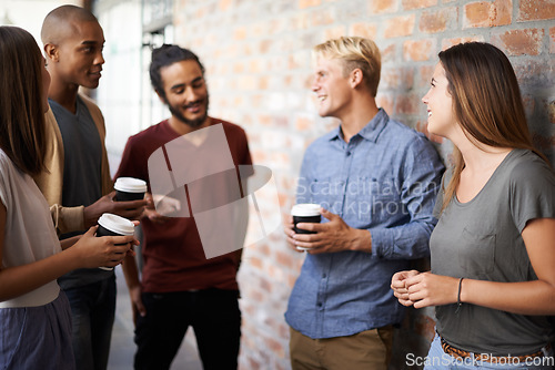 Image of Coffee, friends and students talking in a college hallway for discussion, happiness and a drink. Group of diversity men and women at campus or university for conversation about education and learning