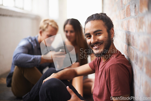 Image of University, happy and portrait of man with friends for education, knowledge and learning. College, academy scholarship and male student smile in hallway on campus for studying, class or school